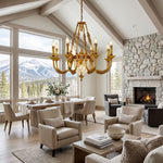 Anders Fluted Glass Urn Brass Chandelier | Fluted Glass and Brass | Illuminating a vaulted living room with a stone fireplace and mountain view | Severn Lighting