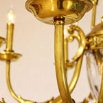 Anders Fluted Glass Urn Brass Chandelier | Fluted Glass and Brass | Close-up detail of the smooth curved brass scroll arm and candle socket | Severn Lighting