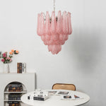 Aubine Pink Textured Glass Tiered Chandelier | Pink Textured Glass and Brass | Real-life installation view displayed near a white mantelpiece | Severn Lighting