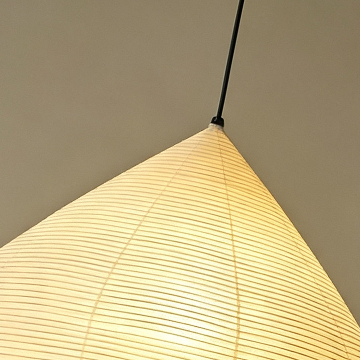 Bryony Teardrop Paper Pendant Light | Washi Paper and Metal | Detail shot focusing on the top section attached to the black cord | Severn Lighting