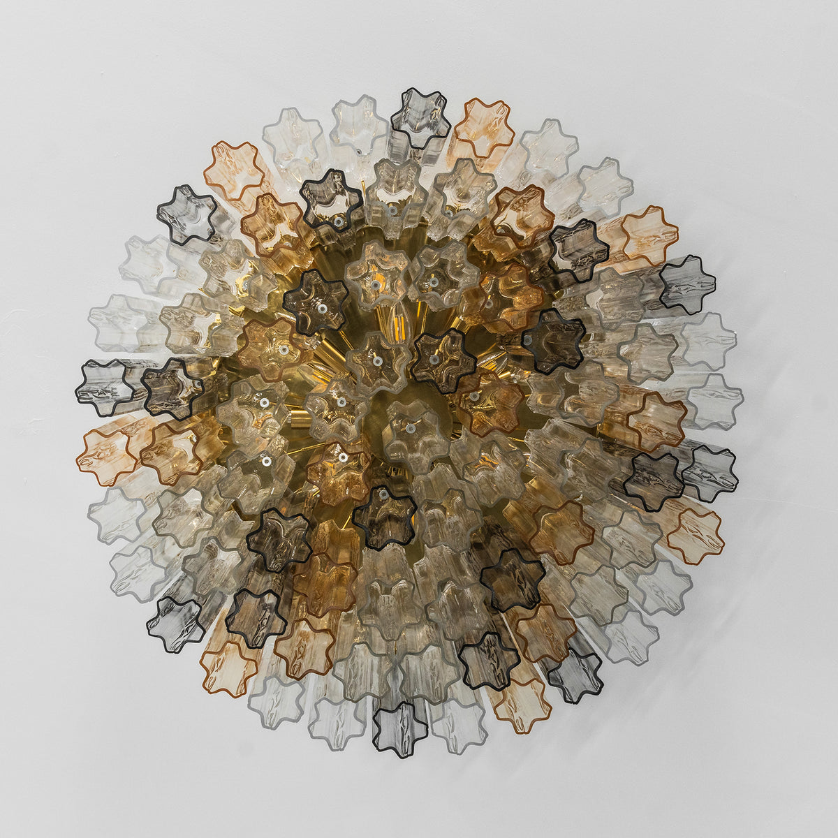 Cassian Tiered Fluted Glass Ceiling Light | Tiered Fluted Glass and Gold Brass | Direct bottom-up view isolated on white showcasing the unlit concentric pattern of the star-shaped rods | Severn Lighting