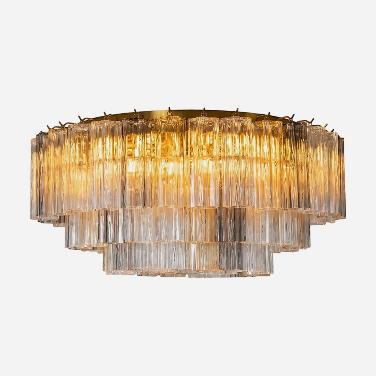 Cassian Tiered Fluted Glass Ceiling Light | Tiered Fluted Glass and Gold Brass | Full front studio shot on a plain background showing the lit multi-layered golden glass rods | Severn Lighting