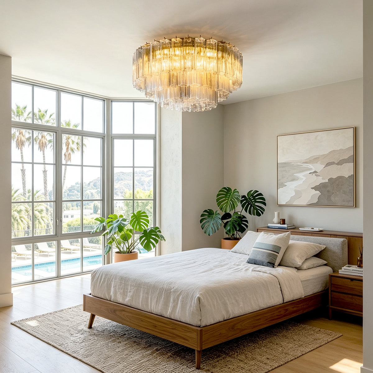 Cassian Tiered Fluted Glass Ceiling Light | Tiered Fluted Glass and Gold Brass | Styled in a modern master bedroom above a wooden bed frame next to large windows with pool views | Severn Lighting
