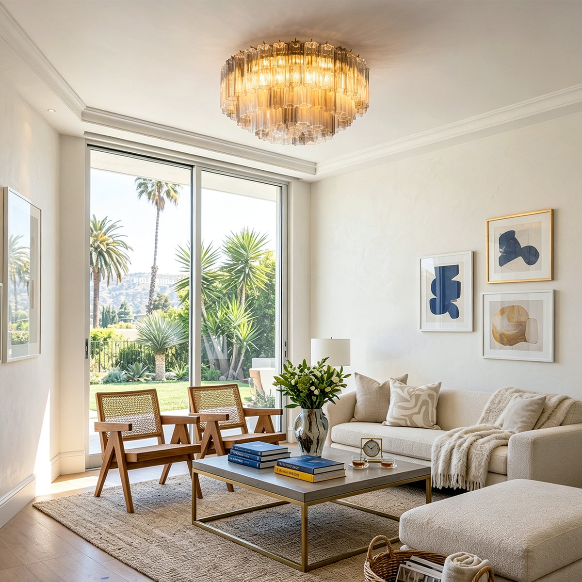 Cassian Tiered Fluted Glass Ceiling Light | Tiered Fluted Glass and Gold Brass | Casting a warm glow in a spacious contemporary living room with a cream fabric sofa and sliding doors | Severn Lighting