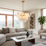 Celestia Art Glass Disc Chandelier | Glass, Metal | Hanging in a spacious modern open-plan living room with a grey sectional sofa and a sleek white coffee table | Severn Lighting