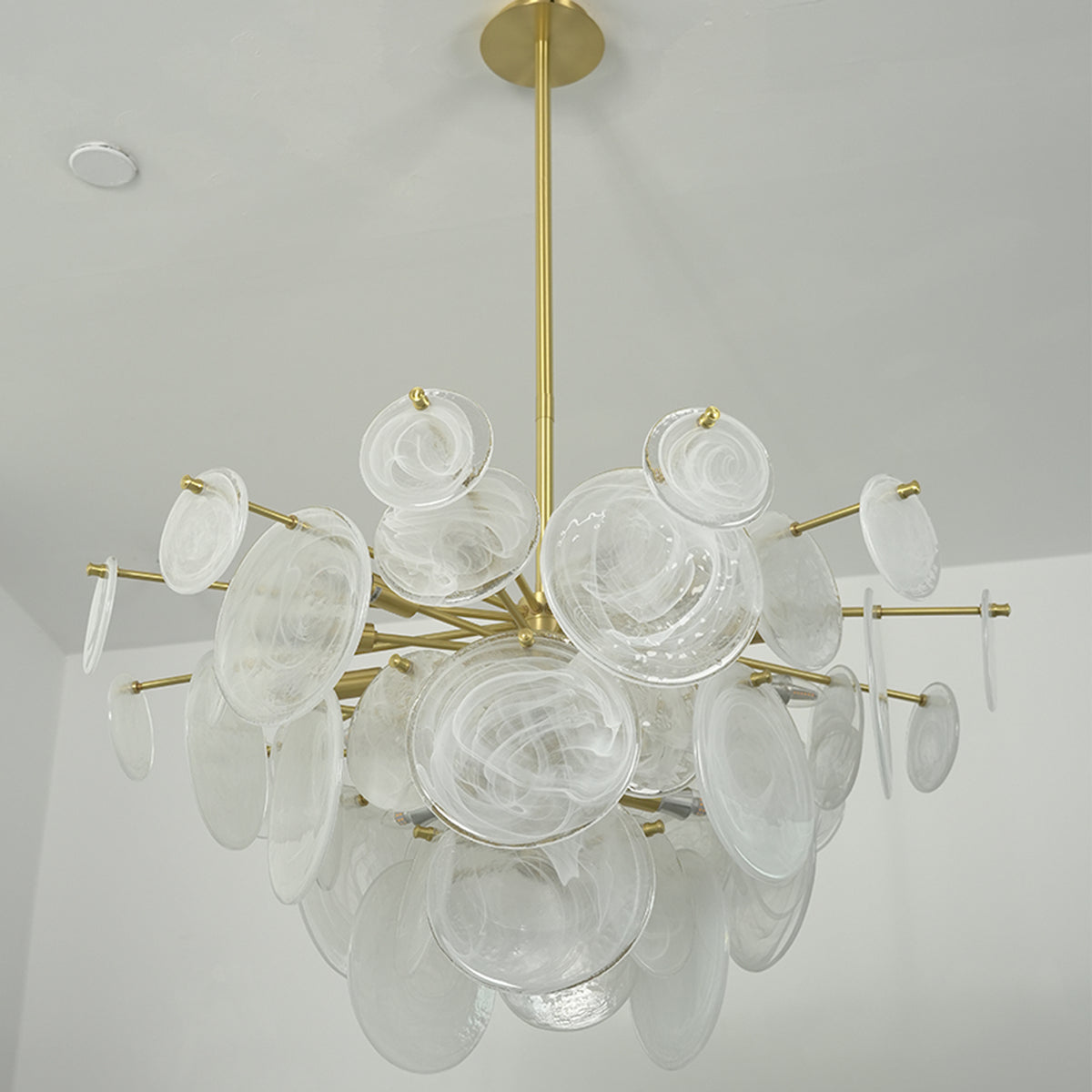 Celestia Art Glass Disc Chandelier | Glass, Metal | Unlit frontal studio view of the multi-disc organic chandelier suspended against a plain off-white background | Severn Lighting