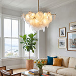 Celestia Art Glass Disc Chandelier | Glass, Metal | Providing refreshing overhead lighting in a cozy contemporary living room with a cream sofa and a large indoor potted plant | Severn Lighting