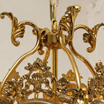 Florian Fretwork Brass Lantern Pendant Light | Glass and Brass | Close-up detail showing the ornate carved brass scrollwork crown | Severn Lighting