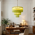 Green Glacier Tier Chandelier | Textured Green Glass | Casting a warm ambient glow over a wooden writing desk and chair in a sophisticated room | Severn Lighting