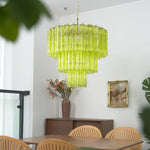 Green Glacier Tier Chandelier | Textured Green Glass | Hanging in a contemporary open space next to a glass railing and wooden furniture | Severn Lighting