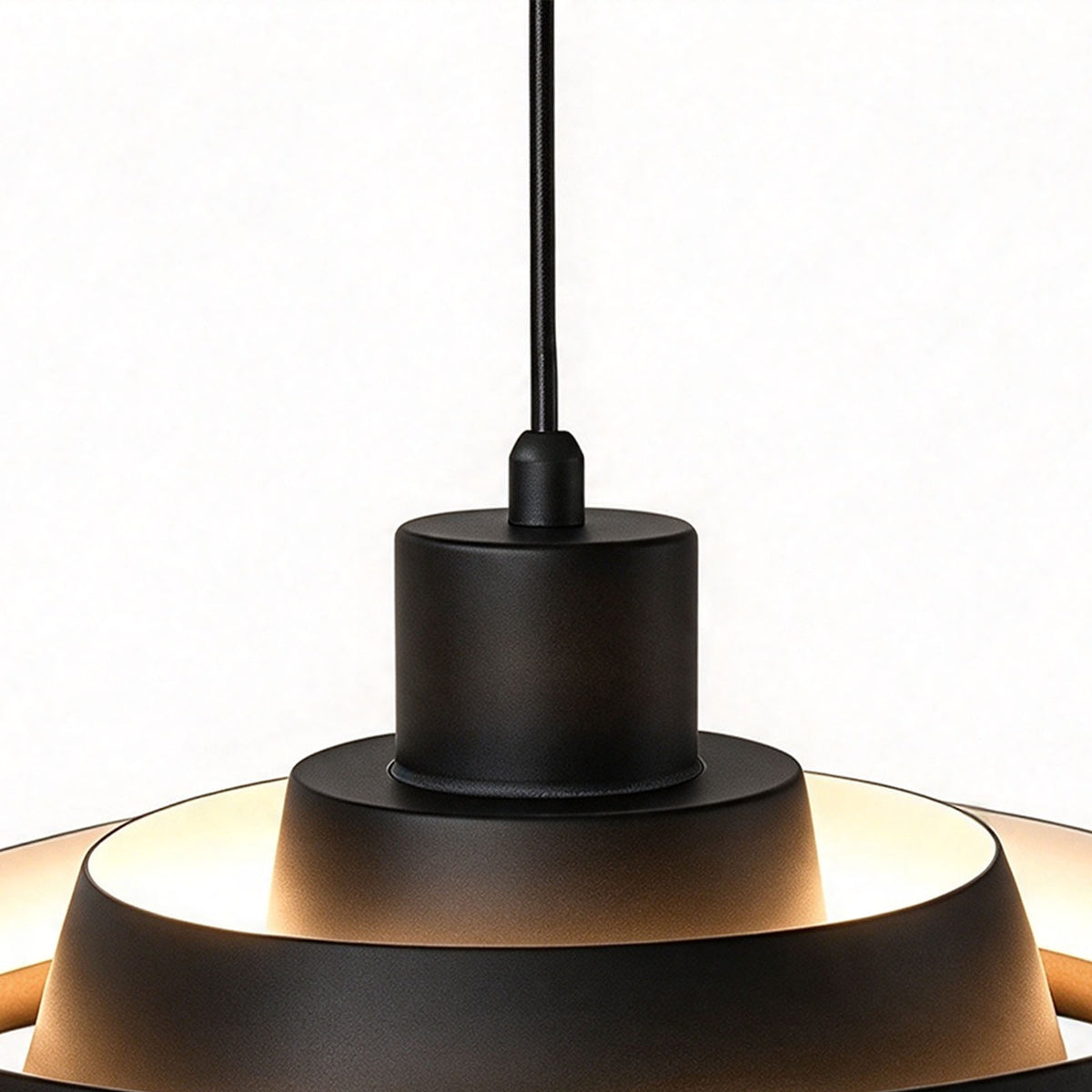 Holmvik Walnut Ring Tiered Metal Pendant Light | Walnut Wood and Metal | Close-up view of the top matte black metal socket holder and cord entry | Severn Lighting