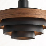 Holmvik Walnut Ring Tiered Metal Pendant Light | Walnut Wood and Metal | Side close-up view highlighting concentric black metal shades beneath wood ring | Severn Lighting
