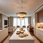 Holmvik Walnut Ring Tiered Metal Pendant Light | Walnut Wood and Metal | Positioned above a central kitchen island in an open-concept living space | Severn Lighting