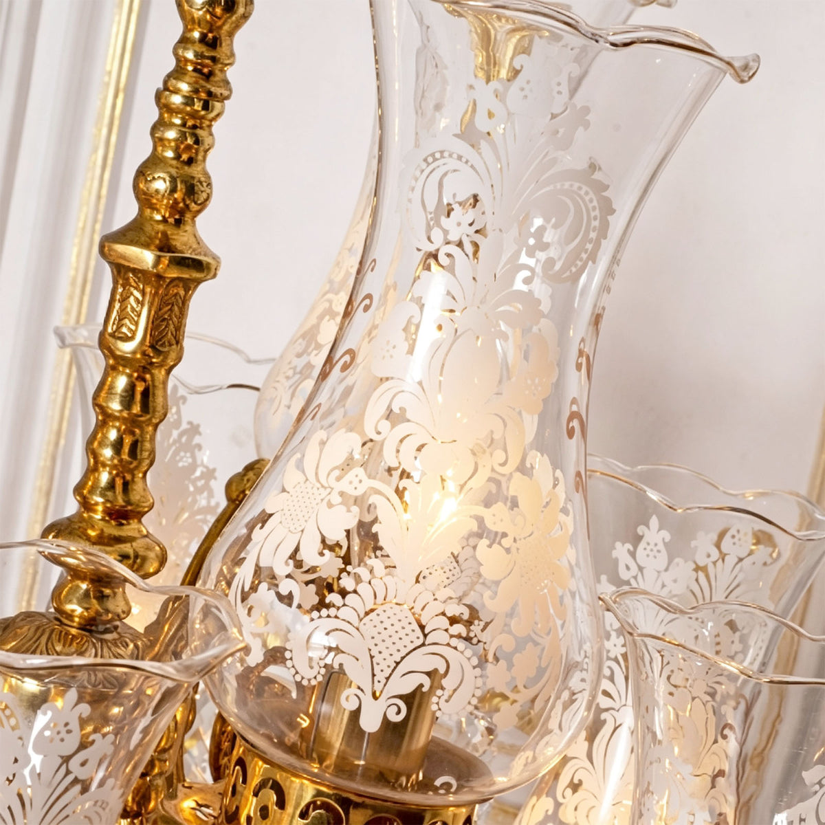 Isambard Candelabra Table Lamp | Cut Crystal and Brass | Close-up detail of the etched glass hurricane shade with floral patterns | Severn Lighting