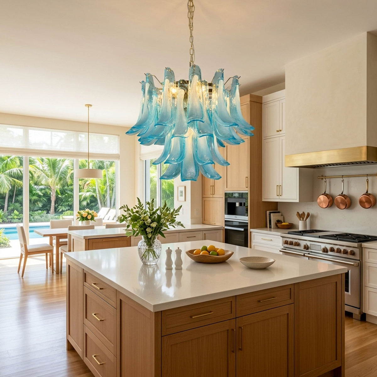 Isar Blue Petal Glass Chandelier | Blue Glass and Brass | Styled over a marble kitchen island counter with wooden cabinetry | Severn Lighting