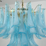 Isar Blue Petal Glass Chandelier | Blue Glass and Brass | Close-up detail of cascading blue petal glass elements on a white background | Severn Lighting