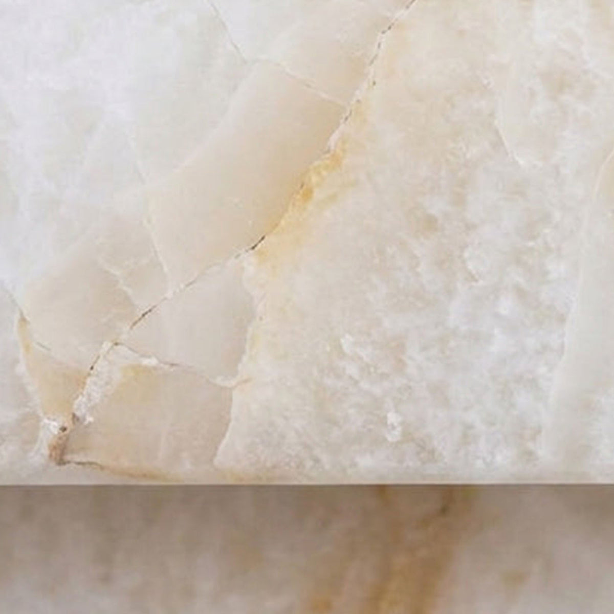 Lamelune Stacked Sconce | Natural Carved Alabaster | Macro detail of crystalline texture and stone veining | Severn Lighting