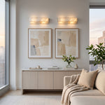 Lamelune Stacked Sconce | Alabaster and Brass | Pair mounted above wall art over console in modern room | Severn Lighting