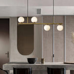 Linear Brass Alabaster Globe Chandelier