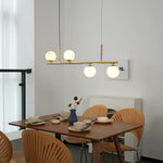 Linear Brass Alabaster Globe Chandelier