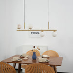 Linear Brass Alabaster Globe Chandelier