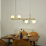 Linear Brass Alabaster Globe Chandelier