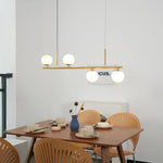 Linear Brass Alabaster Globe Chandelier