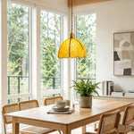 Liora Mosaic Glass Pendant Light | Yellow Mosaic Glass and Brass | Suspended above a wooden dining table and chairs in a bright modern dining room | Severn Lighting