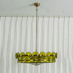 Lovenne Textured Glass Disc Ring Chandelier | Textured Glass and Brass | Studio product view of green glass variant hanging on a plain white backdrop | Severn Lighting