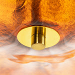 Lovenne Textured Glass Disc Ring Chandelier | Textured Glass and Brass | Macro detail shot of the brass bottom finial and amber glass diffuser disc | Severn Lighting