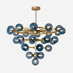 Marisol Aquamarine Glass Bubble Chandelier | Aquamarine Glass and Brass | Front full view on a pure white background, illuminated | Severn Lighting