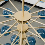 Marisol Aquamarine Glass Bubble Chandelier | Aquamarine Glass and Brass | Detail shot highlighting the central brass frame and support rods | Severn Lighting