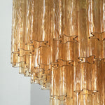 Merlande Amber Glass Tube Tiered Chandelier | Fluted Amber Glass and Brass | Close-up side shot highlighting the lower tier fluted amber glass tubes | Severn Lighting