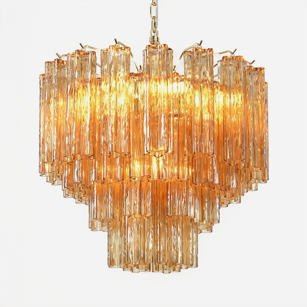Merlande Amber Glass Tube Tiered Chandelier | Fluted Amber Glass and Brass | Front full view on a pure white background, illuminated | Severn Lighting