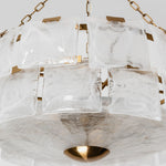 Nyle Tiered Glass Ring Chandelier | Textured Glass and Brass | Studio product shot on a pure white background showing tiered rings | Severn Lighting