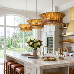 Octavia Sculptural Smoked Glass Chandelier | Textured Smoked Glass | A row of three chandeliers hanging beautifully over a modern white marble kitchen island | Severn Lighting