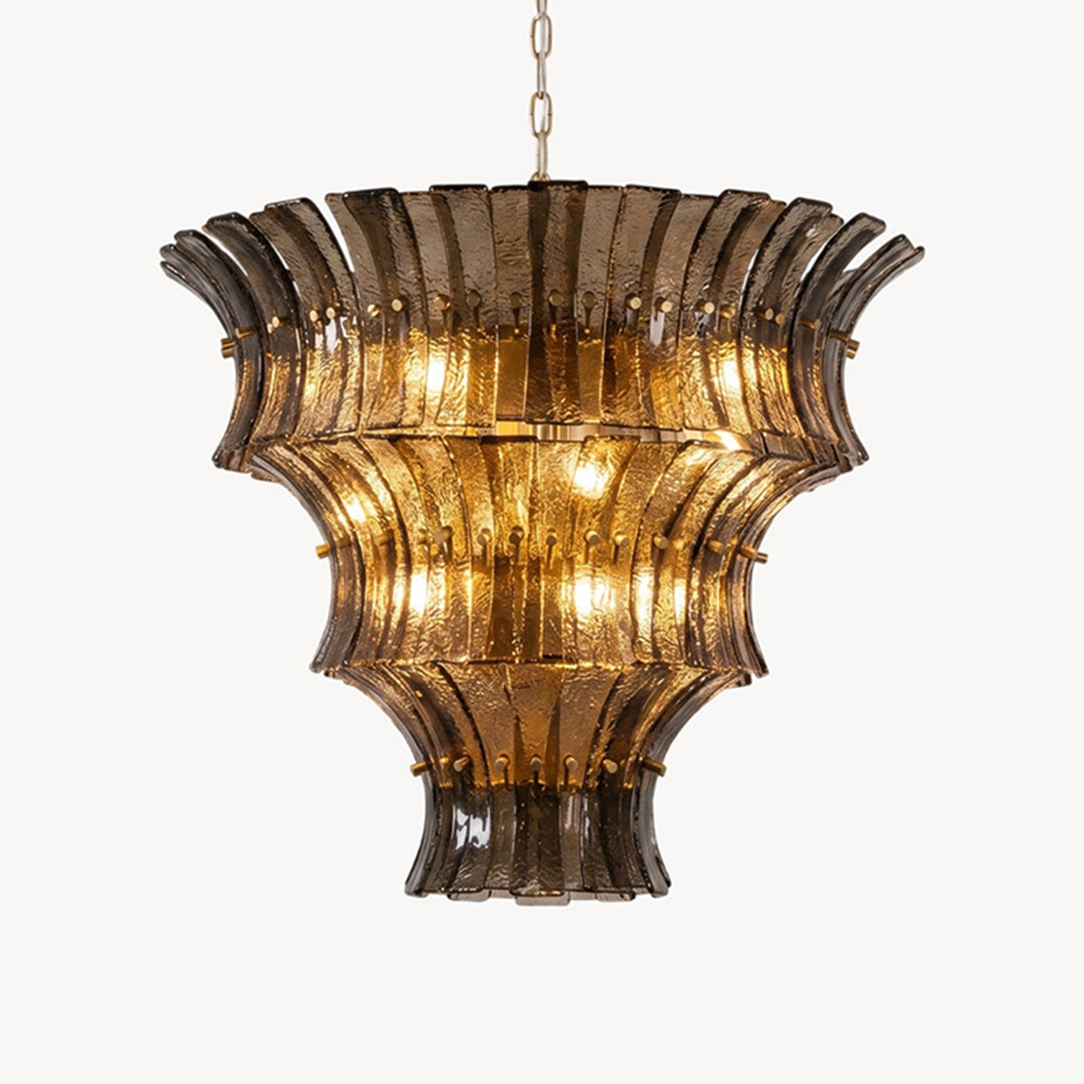 Octavia Sculptural Smoked Glass Chandelier | Textured Smoked Glass | Full front view of the multi-tiered luxury fixture glowing against a plain background | Severn Lighting