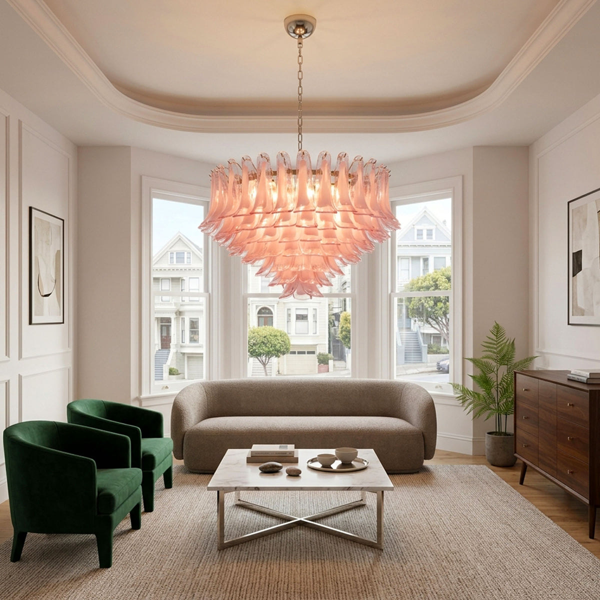 Ombeline Tiered Pink Glass Chandelier | Pink Glass and Brass | Styled in a living room featuring dark green armchairs and bay windows | Severn Lighting