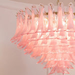 Ombeline Tiered Pink Glass Chandelier | Pink Glass and Brass | Angled view showing the layered cascading pink glass tiers | Severn Lighting