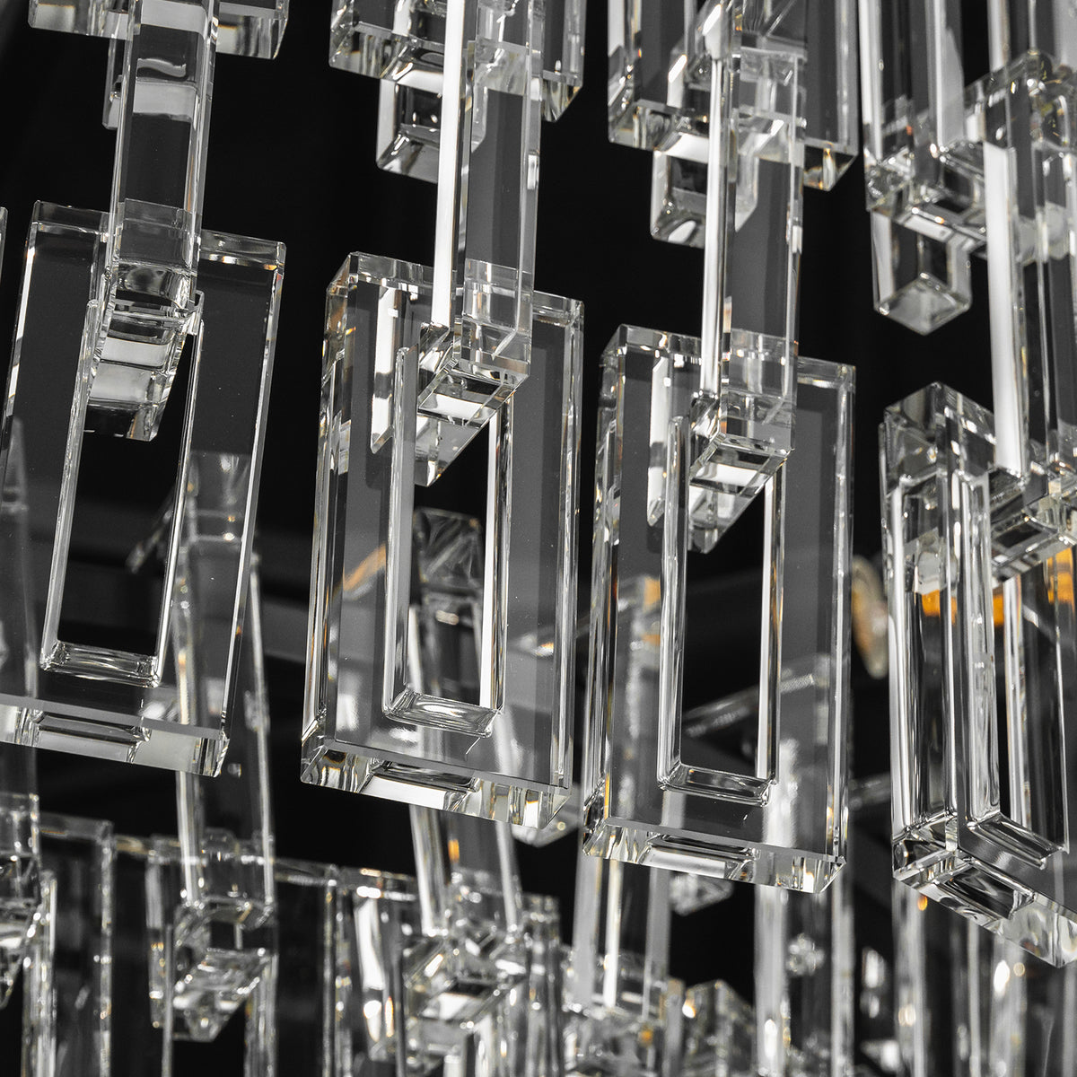 Rainer Cascading Glass Rod Chandelier | Clear Glass and Black Metal | Macro detail view of cascading rectangular clear glass rod links | Severn Lighting