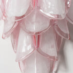 Rosalind Rose Glass Wall Sconce | Glass, Metal | Up-close front view highlighting the tiered overlapping structure and smooth texture of the soft pink frosted glass petals | Detail shot | Severn Lighting