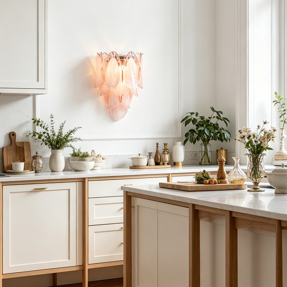 Rosalind Rose Glass Wall Sconce | Glass, Metal | Installed as a charming decorative wall light casting a soft rosy glow in a bright modern kitchen space with indoor plants | Severn Lighting