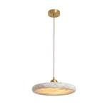 Sabine Alabaster Disc Pendant Light | Natural Alabaster and Brass | Front full view on a pure white background, illuminated | Severn Lighting