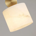 Sabine Alabaster Drum Pendant Light | Natural Alabaster and Brass | Macro texture close-up focusing on the warm light filtering through translucent stone veins | Severn Lighting
