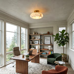 Solaine Alabaster Dome Ceiling Light | Natural Alabaster and Brass | Installed in a bright home office with scenic floor-to-ceiling windows | Severn Lighting