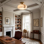 Solaine Alabaster Dome Ceiling Light | Natural Alabaster and Brass | Mounted on a coffered ceiling in a classic home study room | Severn Lighting