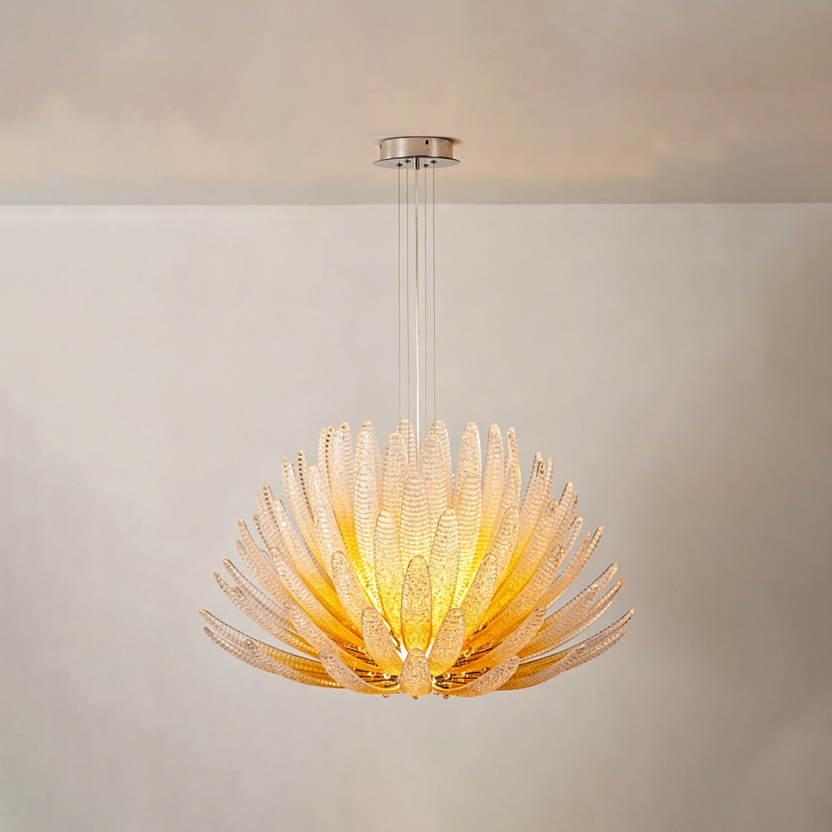 Solaris Agave Glass Starburst Chandelier | Amber Textured Glass | Full product display illuminated beautifully against a clean light neutral grey background | Severn Lighting