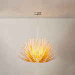 Solaris Agave Glass Starburst Chandelier | Amber Textured Glass | Full product display illuminated beautifully against a clean light neutral grey background | Severn Lighting