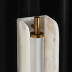 Stellan Alabaster Column Floor Lamp | Natural Alabaster, Brass and Black Metal | Detail shot showing the inner brass structure against dark backdrop | Severn Lighting