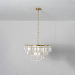 Thalassa Tiered Capiz Shell Chandelier | Capiz Shell, Metal | Front centered studio shot of the unlit white capiz shell chandelier variant suspended against a clean off-white wall | Severn Lighting
